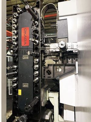 24 Magazzino attrezzi Capacità Alta precisione Centro di lavorazione orizzontale CNC a quattro assi